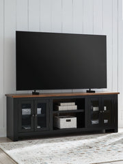 Wildenauer - XL TV Stand With Fireplace Option - Brown / Black